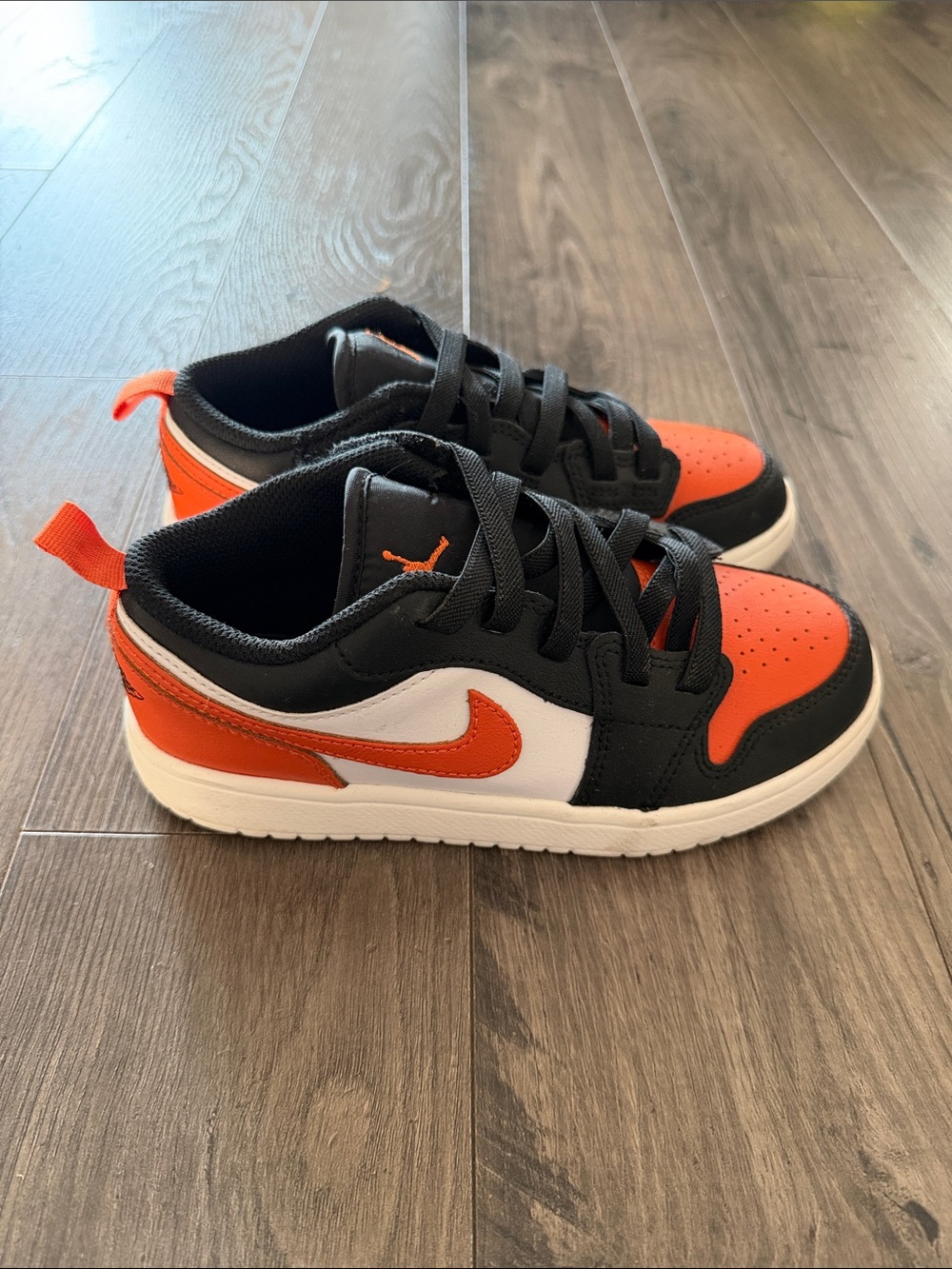 Jordan Kids Black and Orange Low Top Sneakers